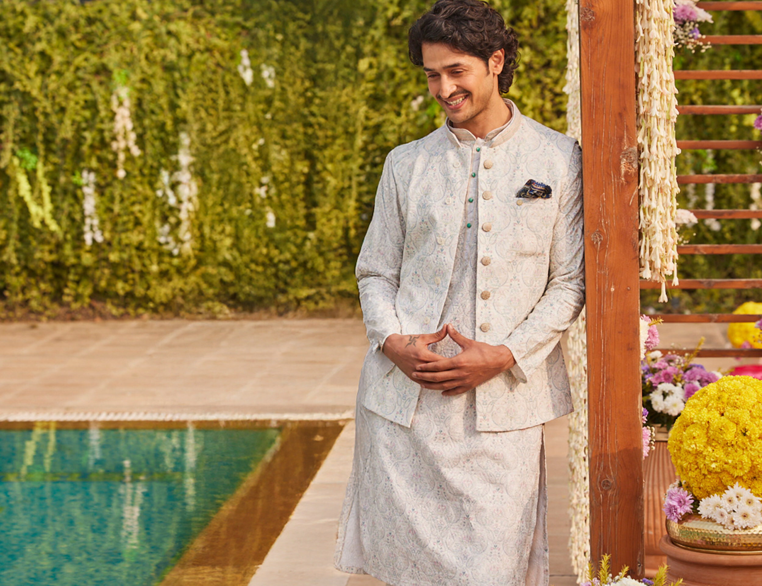 Men wearing white kurta pajama with white jacket 